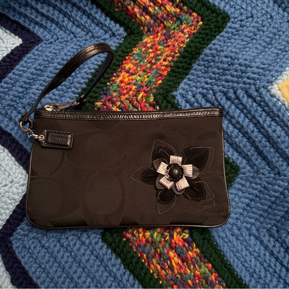 Large Coach signature fabric and patent leather wristlet